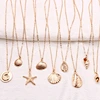gold cowrie shell necklace