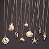 gold cowrie shell necklace