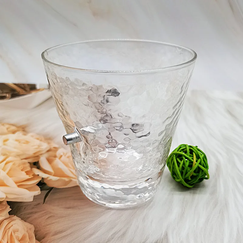whisky glass inlaid with bullets
