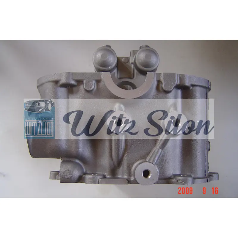 CYLINDER HEAD NISSAN Z24 (4 spark plug) CARBURATOR 11041-20G13 / 11041-13F00 / 11041-22G00 /  2.4L D21
