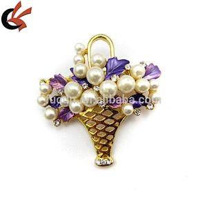 a basket of pearl flowers brooch
