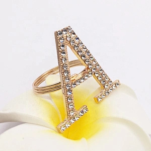 Customized fancy wedding table decoration accessories rhinestone gold metal letter napkin ring