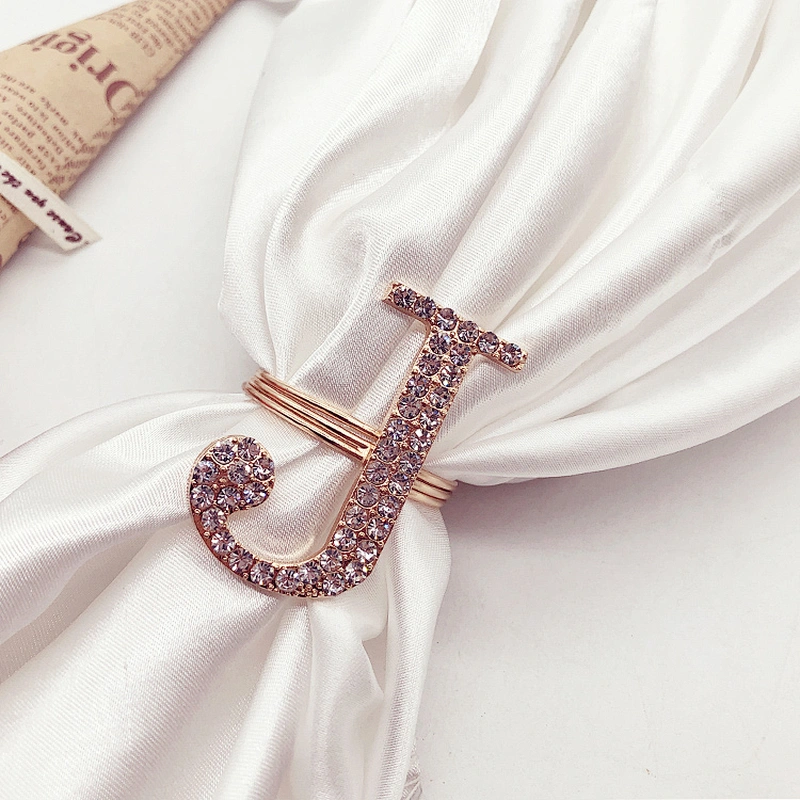 Latest design plating gold rhinestone napkin ring crystal diamond napkin ring for Wedding table centerpieces