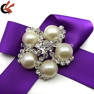 a basket of pearl flowers brooch