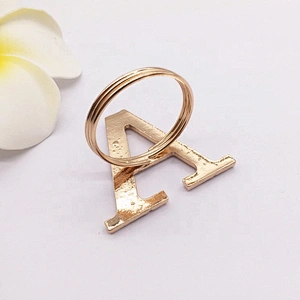 Customized fancy wedding table decoration accessories rhinestone gold metal letter napkin ring