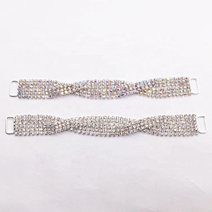 Women latest model fashion twisty design swimming wear rhinestone connector