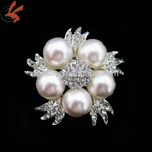 a basket of pearl flowers brooch