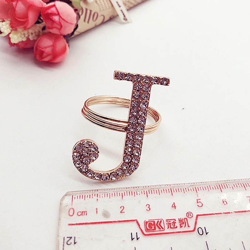 Latest design plating gold rhinestone napkin ring crystal diamond napkin ring for Wedding table centerpieces