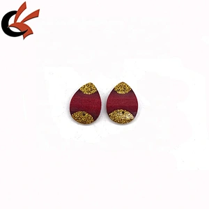 Red and gold glitter glue on resin loose stones