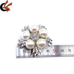 wholesale cheap price in bulk brooch pearl stone brooch for wedding invitations