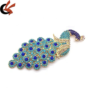 Customize metal peacock feather blue lake hijab luxury accessory rhinestone brooch for DIY hat and dress