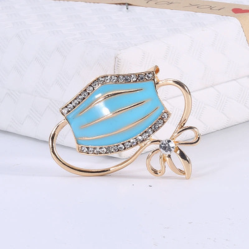 Popular new creative fashion jewelry enamel drop oil mask-shaped brooch