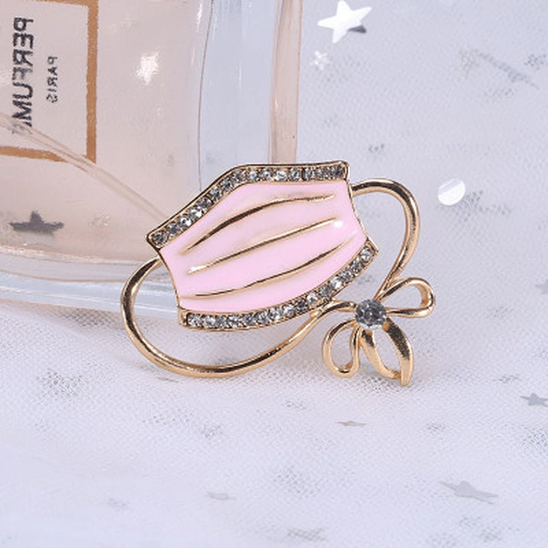 Popular new creative fashion jewelry enamel drop oil mask-shaped brooch