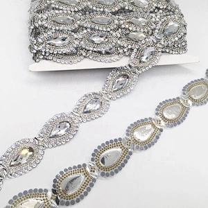 China factory iron on crystal rhinestone resin stone hot melt adhesive trims chain for clothing