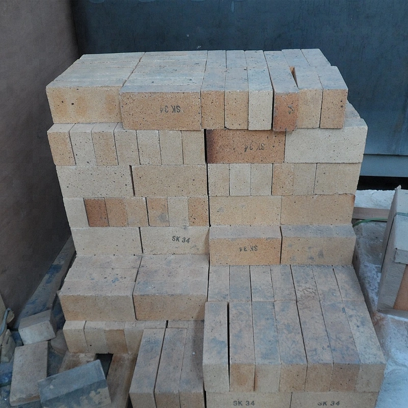 handmade SK32 SK34 Cheap Thin curved fire red clay Brick for heating furnace