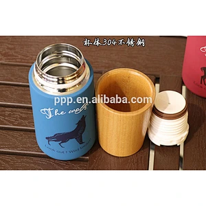 Double wall stainless steel heat transfer vacuum water bottle with wooden lid