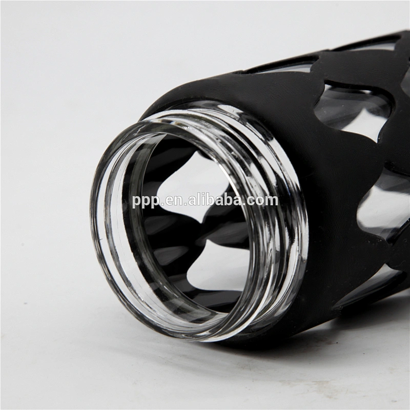 Eco-friendly feature borosilicate glass water bottle with black silicone sleeve and handle