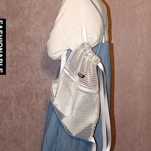 Foldable black poly fabric mesh drawstring sports bag with front zipper pocket
