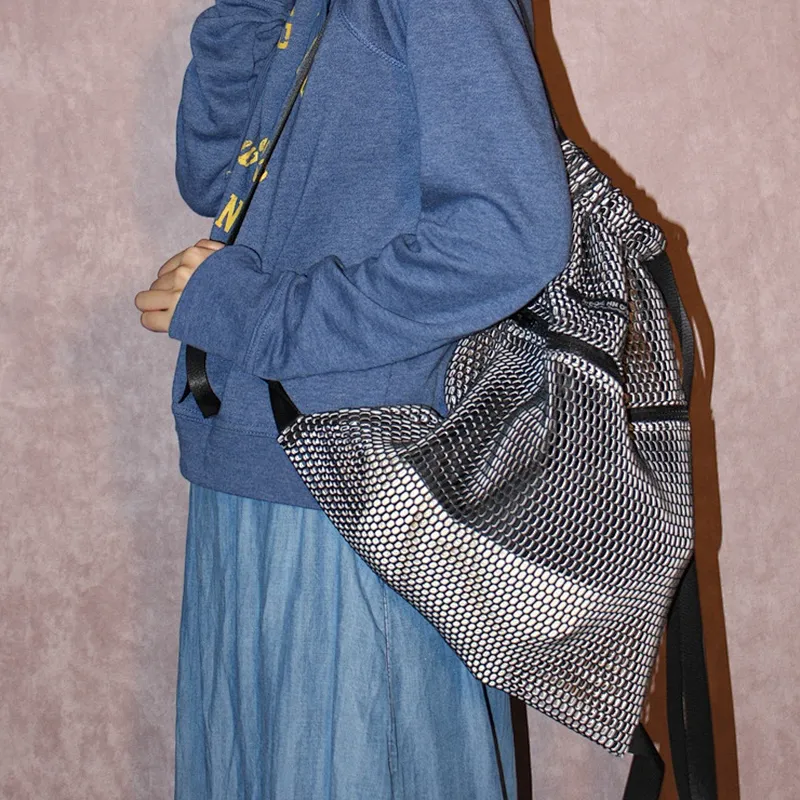 Foldable black poly fabric mesh drawstring sports bag with front zipper pocket