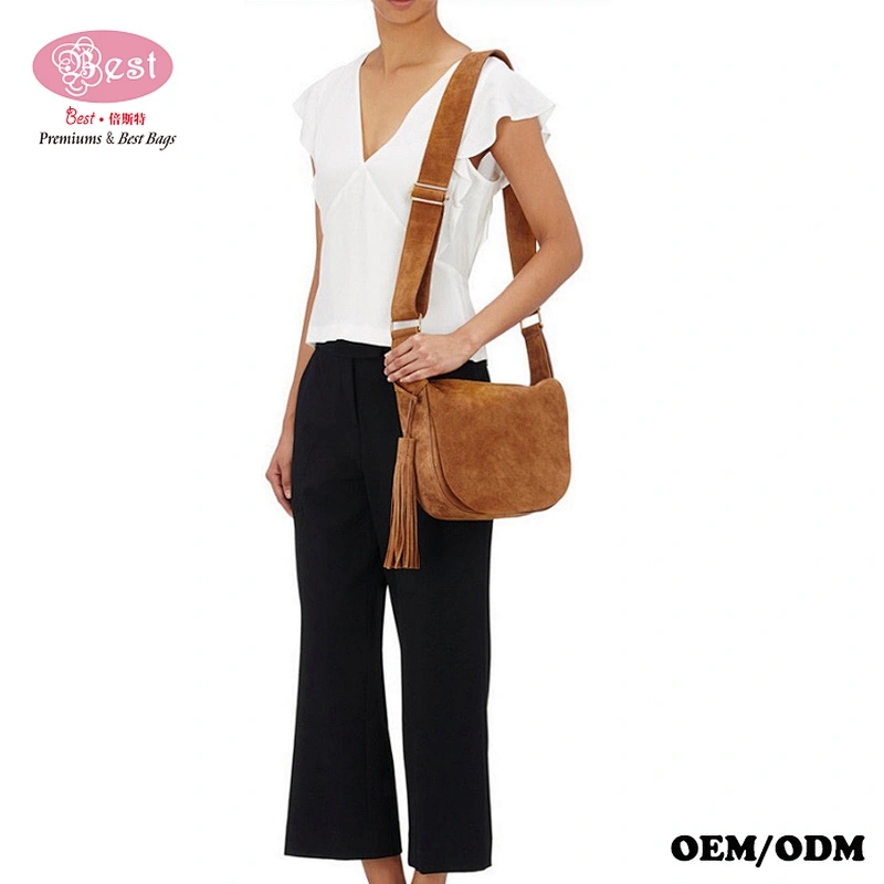 Hot Selling Designer Branded Pink Suede Leather Small Saddle Bag with Tassel Charm Hobo Bag for Lady