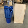 tipped tricone drill bit