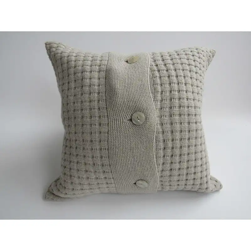 Grey  knit  cushion with buttons