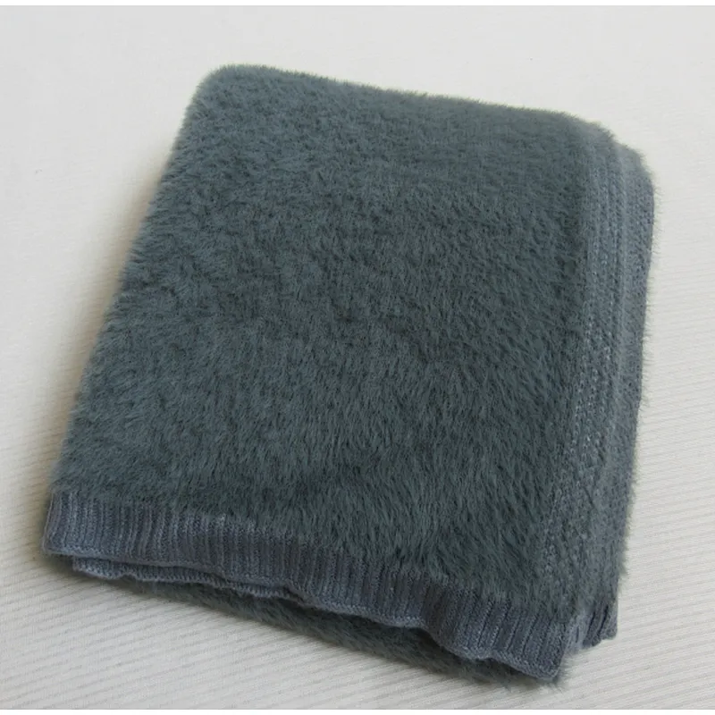 SOLID KNITTED BLANKET WITH RIB ON THE EDGE