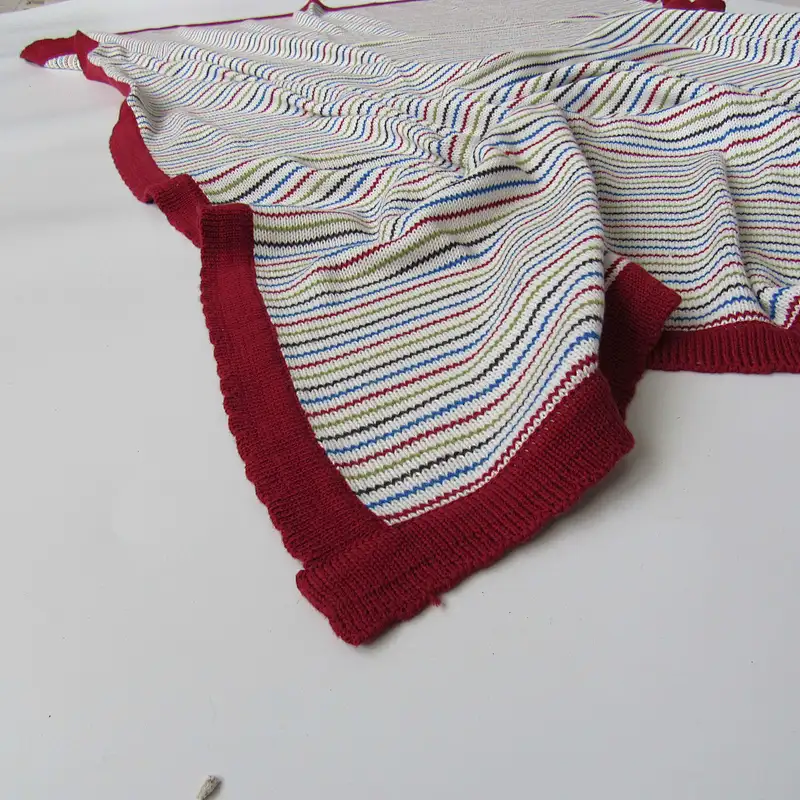 Stripped knitted baby blanket