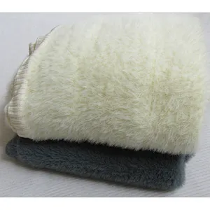 SOLID KNITTED BLANKET WITH RIB ON THE EDGE