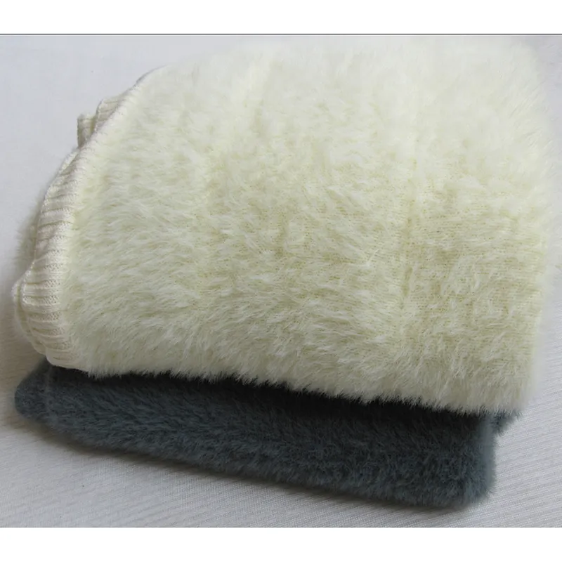 SOLID KNITTED BLANKET WITH RIB ON THE EDGE