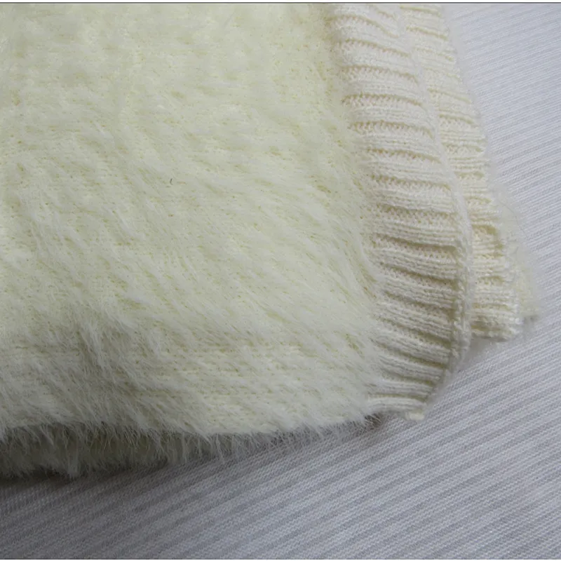 SOLID KNITTED BLANKET WITH RIB ON THE EDGE