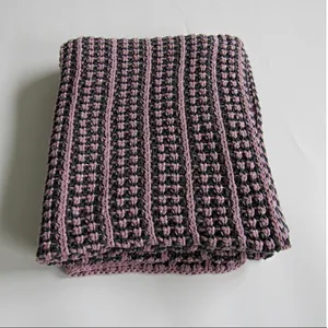 knitted blanket with drop stitching