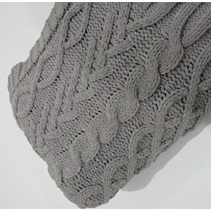 KNITTED CABLE BLANKET WITH RELUX