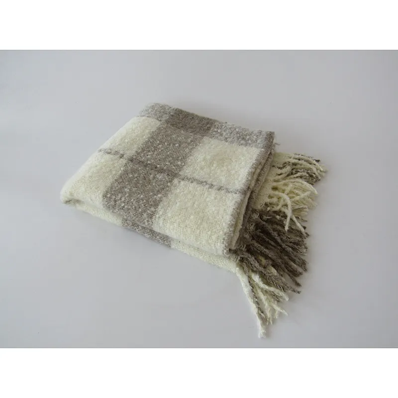 check knit woven blanket with tassles