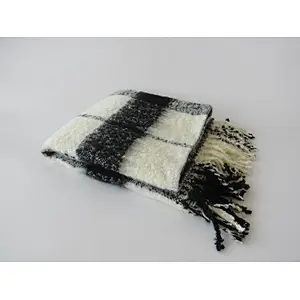 check knit woven blanket with tassles