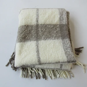 check knit woven blanket with tassles