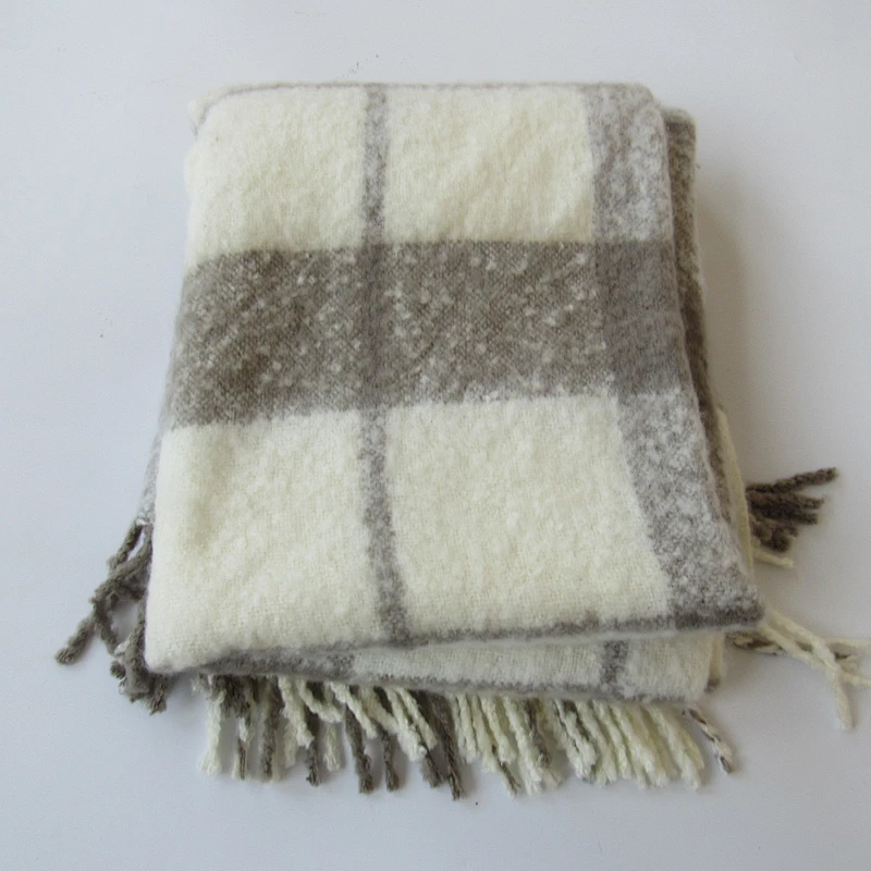 check knit woven blanket with tassles