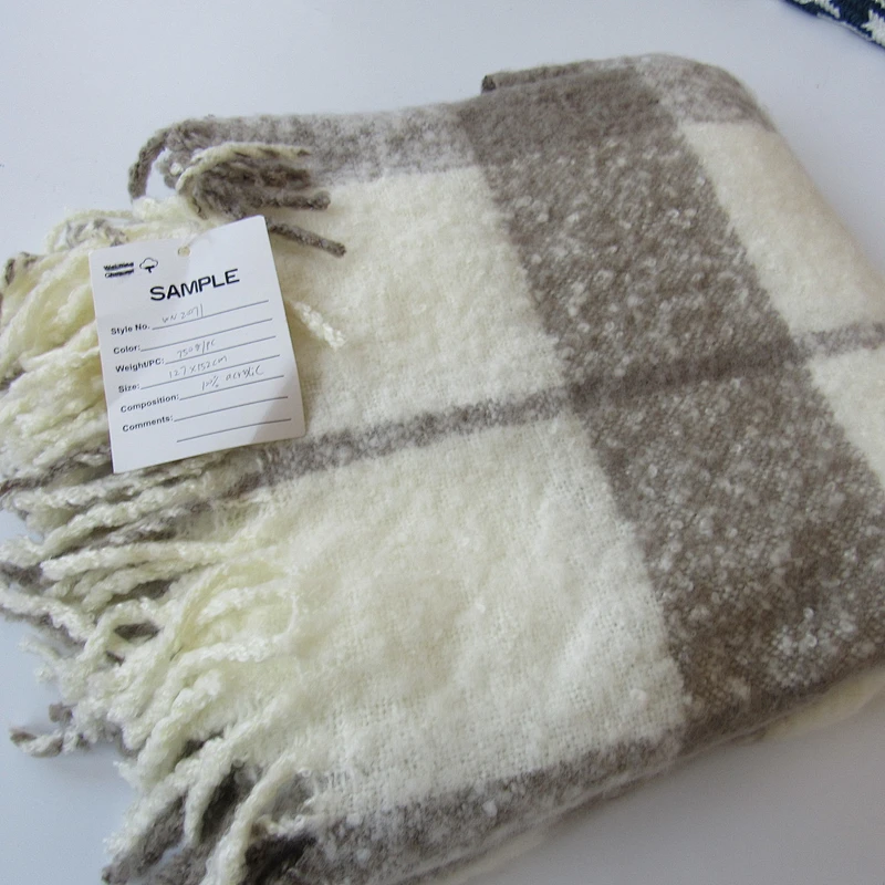 check knit woven blanket with tassles