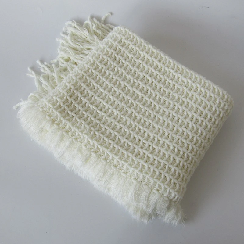 solid knit acrylic woven blanket with tassels