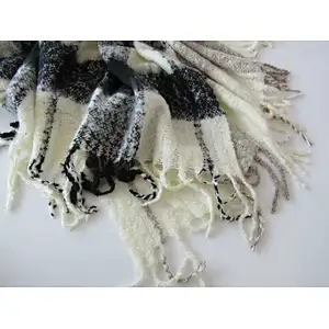 check knit woven blanket with tassles