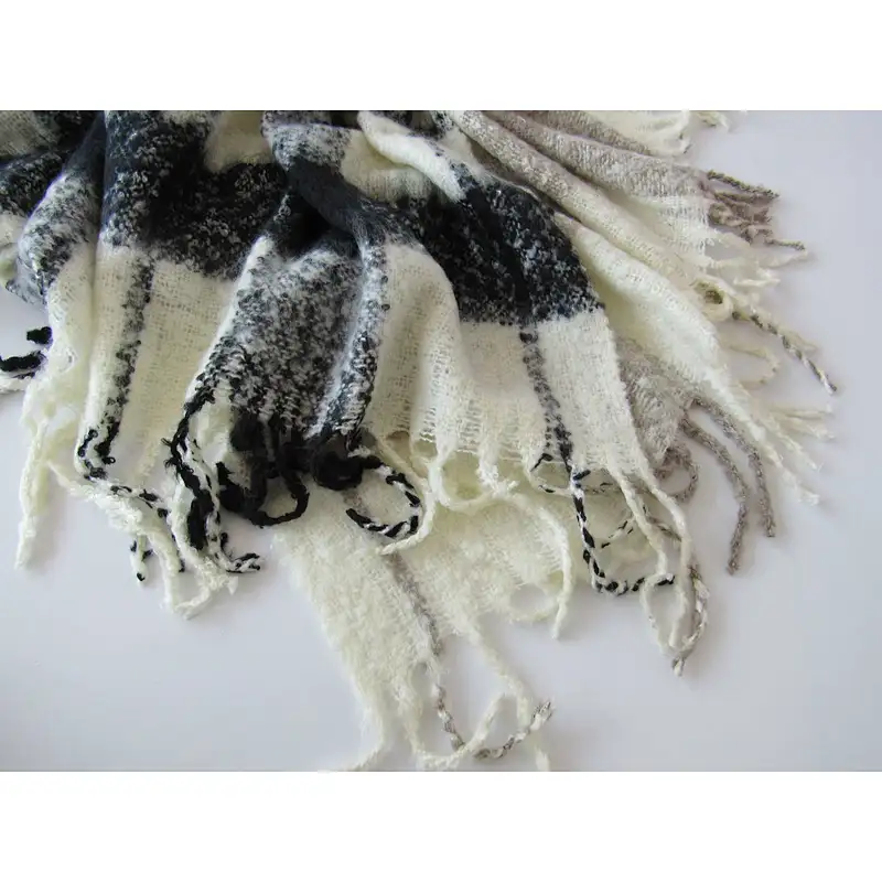 check knit woven blanket with tassles