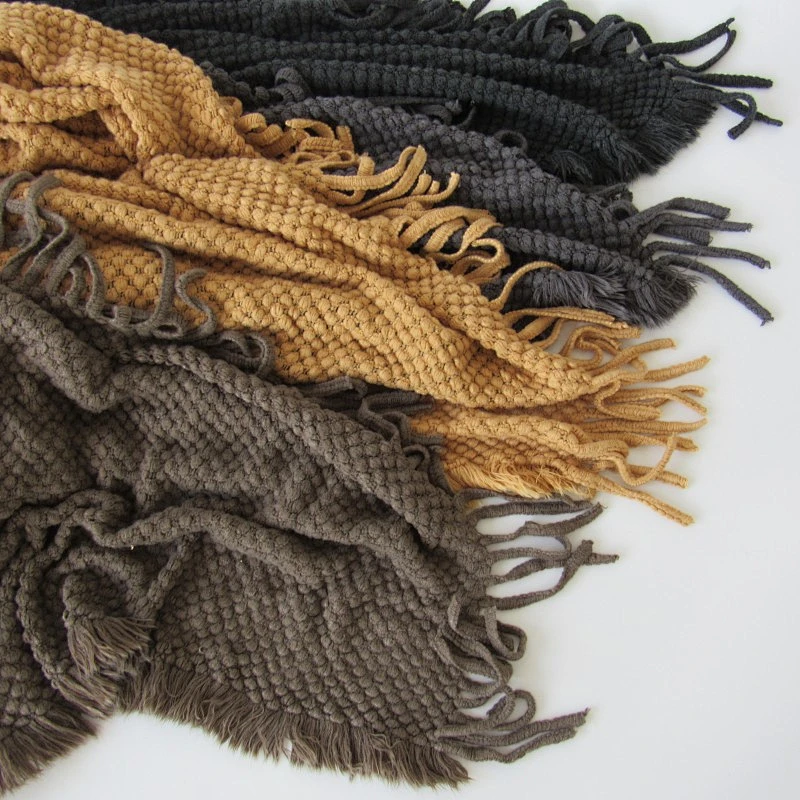 solid acrylic knit woven blanket with tassels
