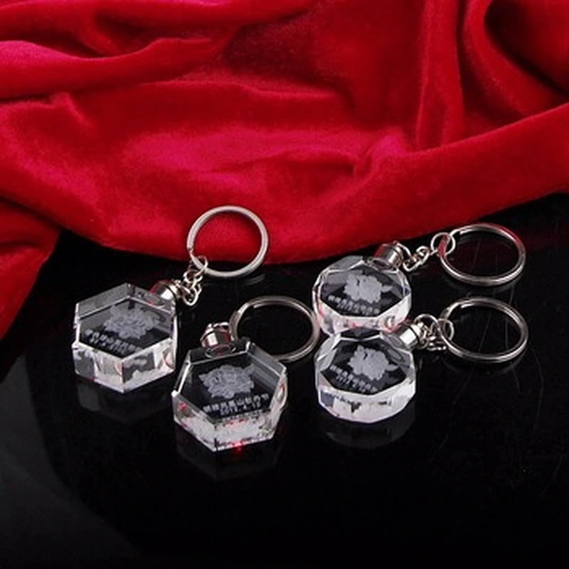 Wholesale custom souvenirs 3d oval laser engraved/engraving glass rhinestone car logo led crystal keychain with box