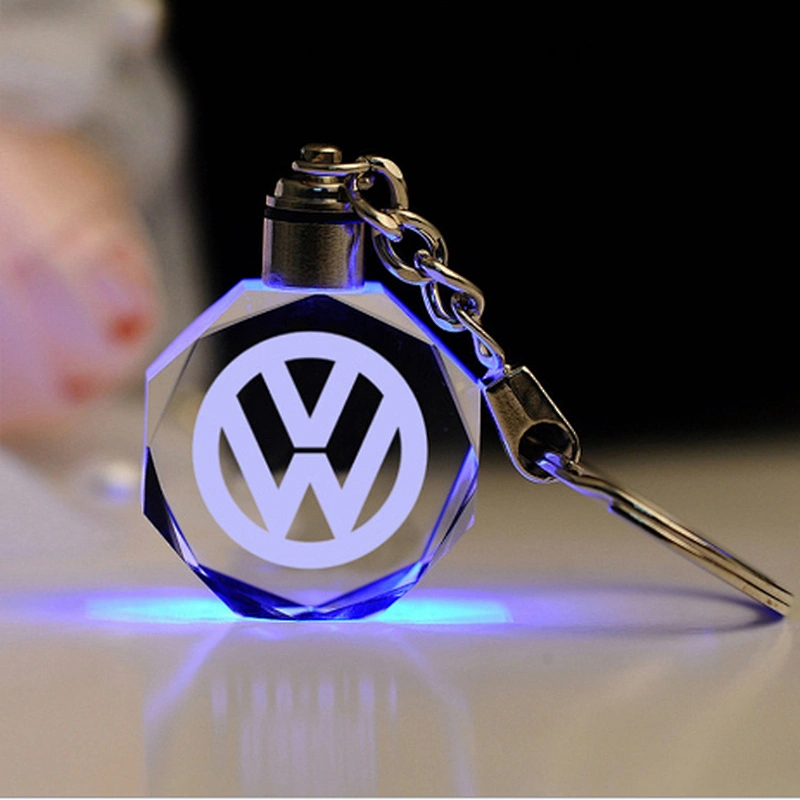 Wholesale custom souvenirs 3d oval laser engraved/engraving glass rhinestone car logo led crystal keychain with box