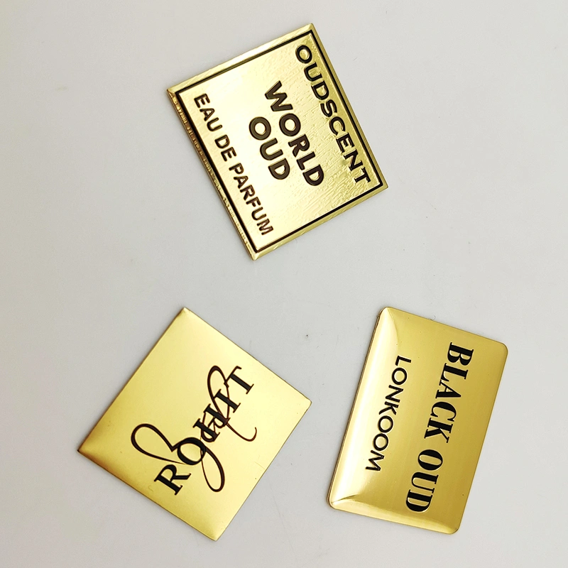 Accept custom logo embossed metal label brand perfume stickers designed for custom stickers