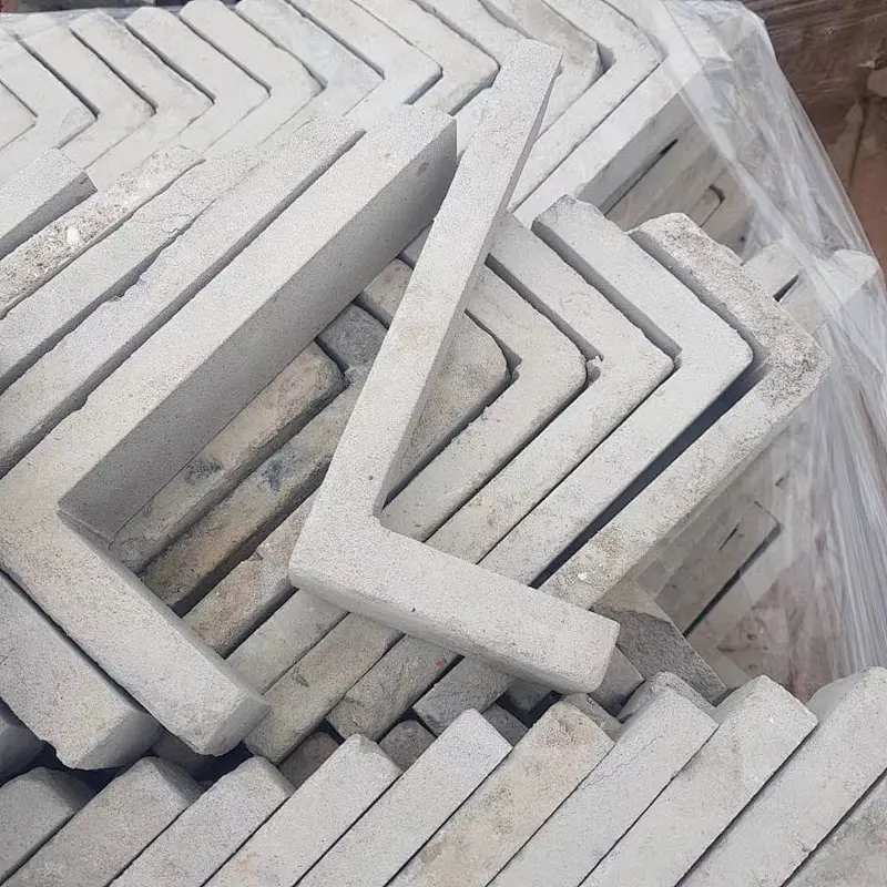 White Concrete with Clay Thin Brick Veneer Corners