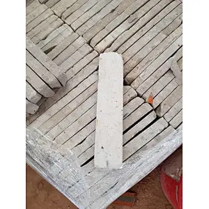 White Concrete with Clay Thin Brick Veneer Corners