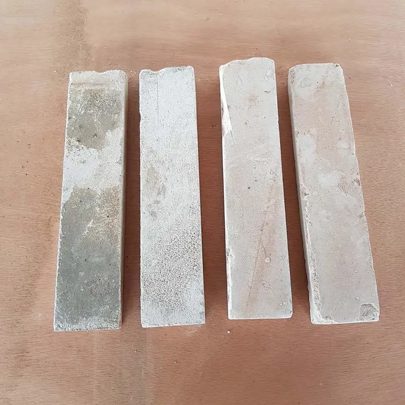 White Concrete with Clay Thin Brick Veneer Corners