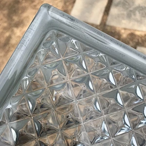 Transparent textured hollow glass brick