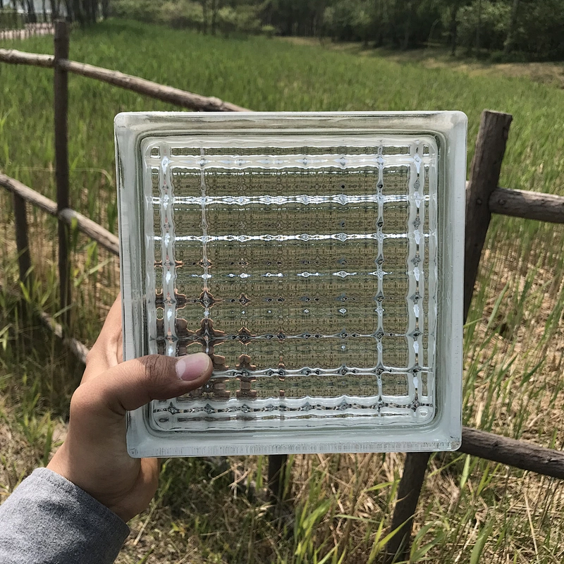 Hollow glass brick with parallel grain